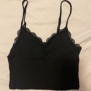 Rouje cropped black tank top with adjustable straps and buttons